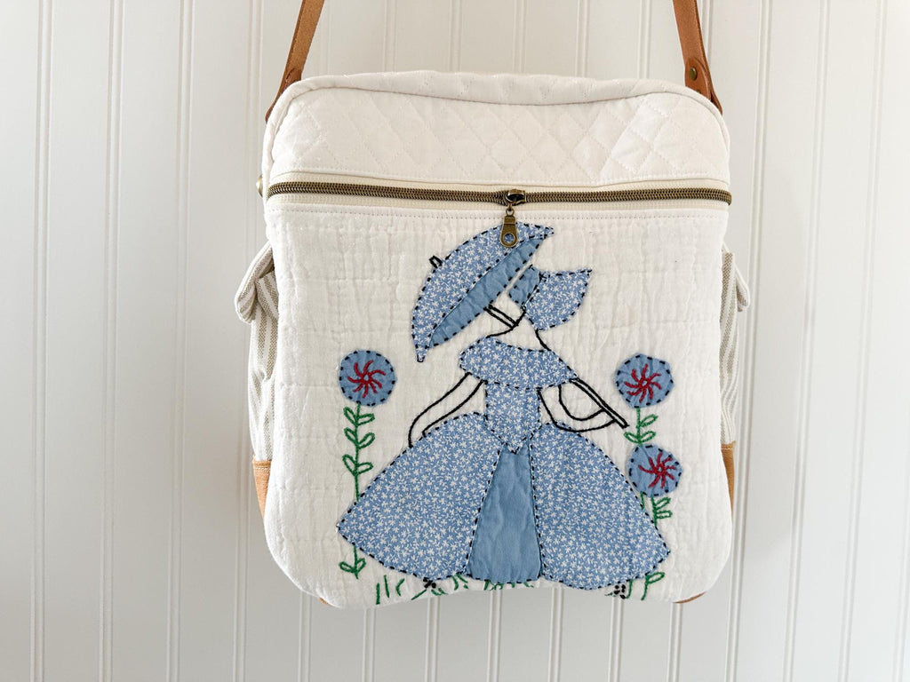 Ladies with Umbrella quilt bag with leather crossbody strap
