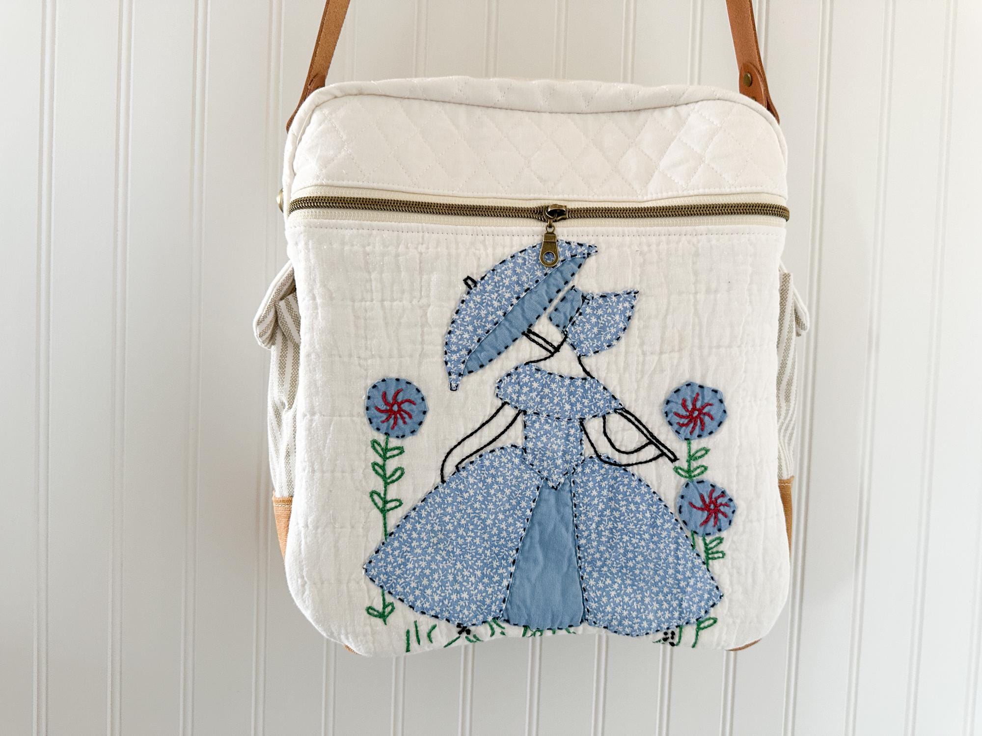 Ladies with Umbrella quilt bag with leather crossbody strap